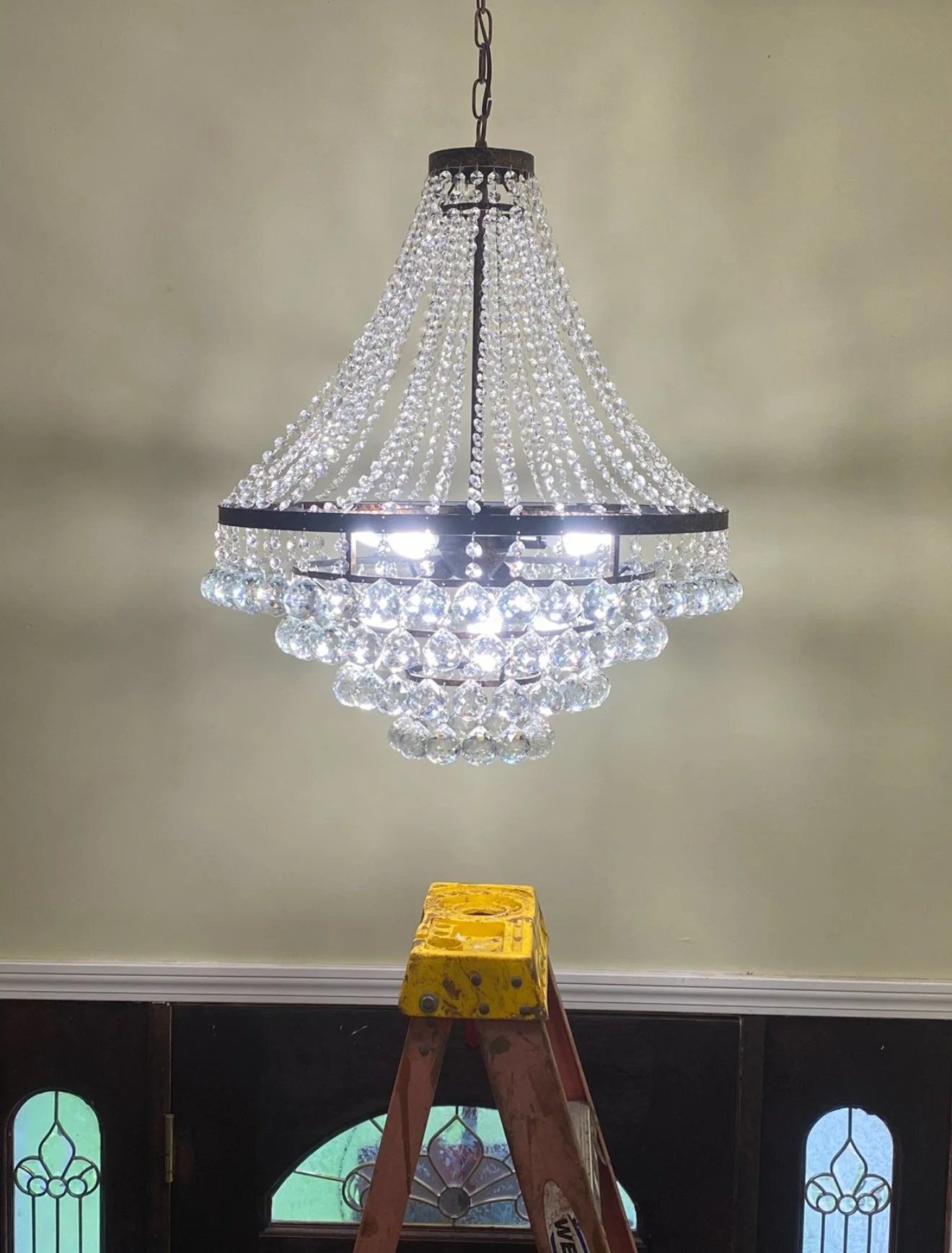 Chandelier installation by Ballaro Electric